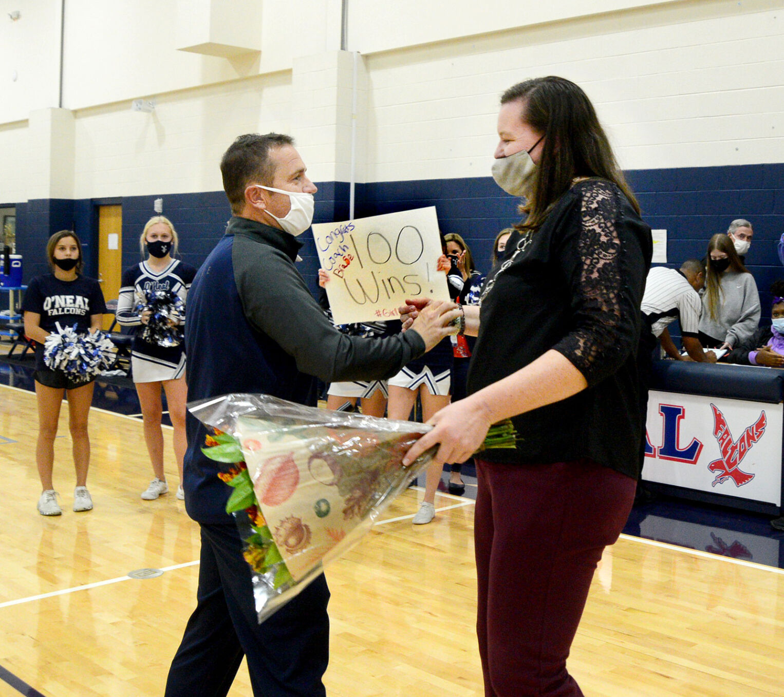 Head Coach Lulu Brase wins 100th game 01.jpeg